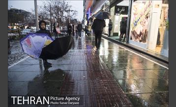 خیابان آیت در یک روز بارانی 18