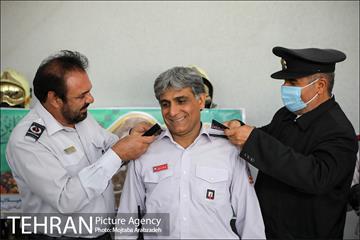 آیین پرچم گردانی حرم امام رضا در ایستگاه آتشنشانی 20