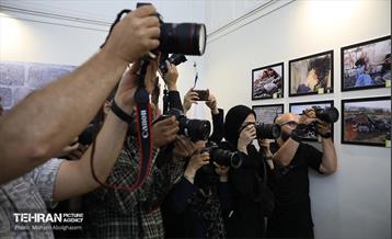 افتتاح نمایشگاه عکس «نفس‌های سوخته» 6