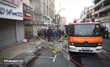 آتش سوزی در خیابان بهار تهران 54