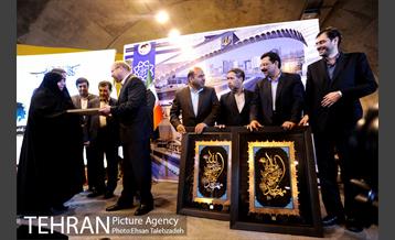 آیین بهره برداری از پروژه های امتداد بزرگراه شهید حکیم و تونل شهدای غزه 19