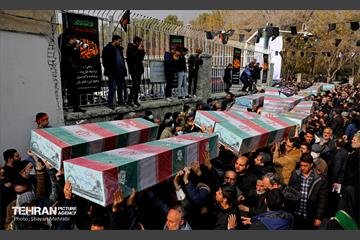 تشییع پیکر ۲۰۰ شهید گمنام دفاع مقدس در تهران 43