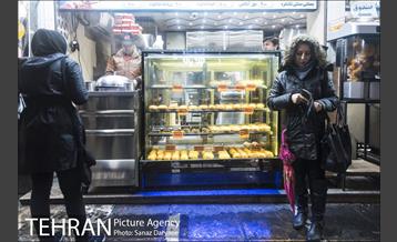 خیابان آیت در یک روز بارانی 14