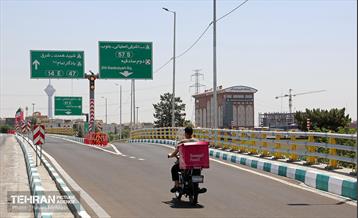 بهره‌برداری از تقاطع غیرهمسطح بزرگراه همت و اشرفی اصفهانی 41