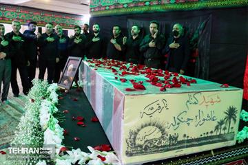 بدرقه پیکر مطهر شهید گمنام دوران دفاع مقدس در اداره‌کل سرمایه‌انسانی 12