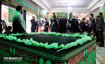 بدرقه پیکر مطهر شهید گمنام دوران دفاع مقدس در اداره‌کل سرمایه‌انسانی 15