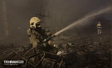 حریق در بازار آهن شادآباد 11