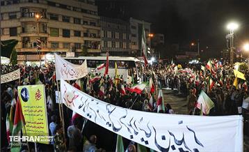 آیین بدرقه زائر اولی‌ها به‌ سوی عتبات عالیات در میدان انقلاب 10