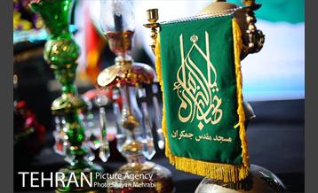 اهتزاز پرچم مسجد جمکران در برج میلاد 19