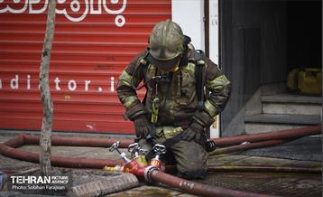 آتش سوزی در خیابان بهار تهران 62