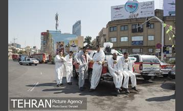 عملیات گندزدایی زدایی و ضدعفونی معابر اصلی و فرعی خیابان ولیعصر‎(عج) 27