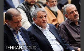 تجلیل از خبرنگاران و عکاسان عرصه دفاع مقدس با حضور شهردار تهران 9