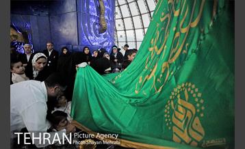 اهتزاز پرچم حرم حضرت معصومه (س) در برج میلاد 28