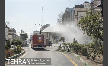 عملیات گندزدایی زدایی و ضدعفونی معابر اصلی و فرعی خیابان ولیعصر‎(عج) 26