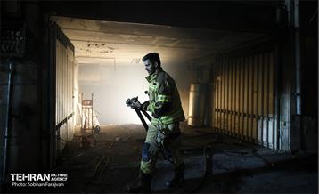 آتش سوزی در خیابان بهار تهران 28