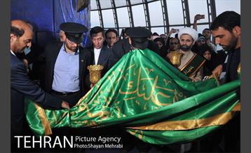 اهتزاز پرچم حرم حضرت معصومه (س) در برج میلاد 22