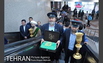 اهتزاز پرچم حرم حضرت معصومه (س) در برج میلاد 14