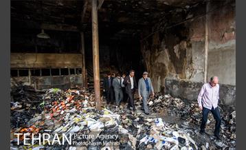 بازدید شهردار تهران از خسارت آتش سوزی اخیر میدان حسن آباد 18