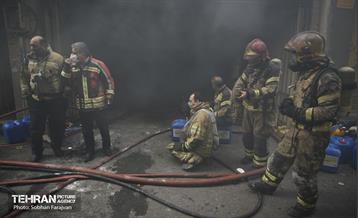 آتش سوزی در خیابان بهار تهران 59