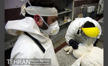 تطهیر و تدفین جانباختگان کرونایی در بهشت زهرا(س) 6