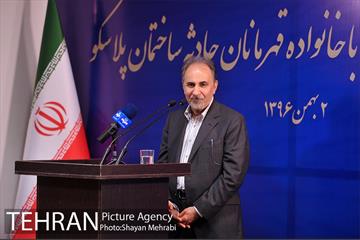 تجلیل از خانواده شهدای آتش‌نشان حادثه پلاسکو با حضور شهردار تهران 38