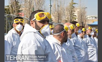 عملیات گندزدایی زدایی و ضدعفونی معابر اصلی و فرعی خیابان ولیعصر‎(عج) 10