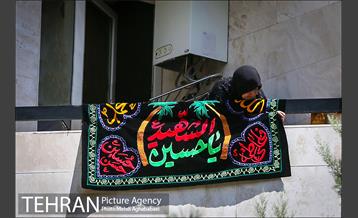 هرخانه، یک حسینیه، یک پرچم 19