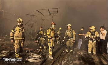 حریق در بازار آهن شادآباد 12