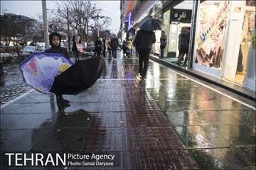 خیابان آیت در یک روز بارانی 18