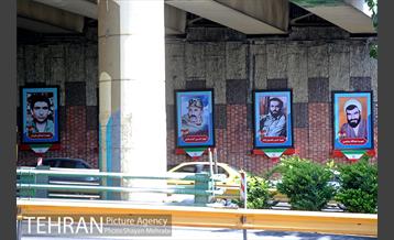 نصب تصاویر مربوط به دوران دفاع مقدس در معابر پایتخت 12