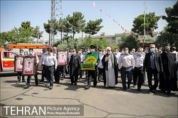 آیین پرچم گردانی حرم امام رضا در ایستگاه آتشنشانی 5