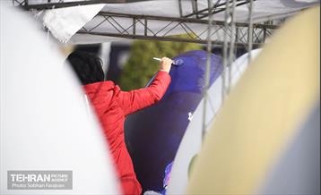 جشنواره تخم‌مرغ رنگی در میدان هفت تیر 11