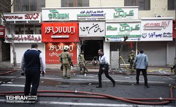 آتش سوزی در خیابان بهار تهران 61