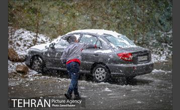 بارش نخستین برف پاییزی در تهران 24