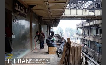 تخلیه اجناس مغازه های باقی مانده ساختمان پلاسکو -1 11