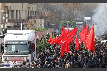 تشییع پیکر ۲۰۰ شهید گمنام دفاع مقدس در تهران 3
