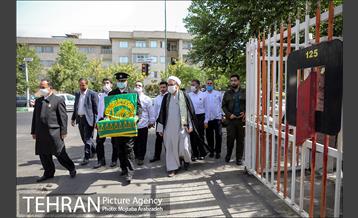 آیین پرچم گردانی حرم امام رضا در ایستگاه آتشنشانی 3