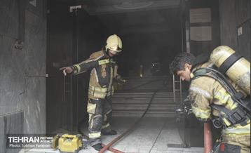 آتش سوزی در خیابان بهار تهران 68