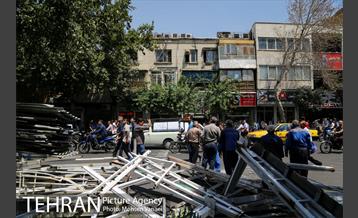 رفع خطر طبقه سوم پاساژ 102 در خیابان امام خمینی(ره)  26