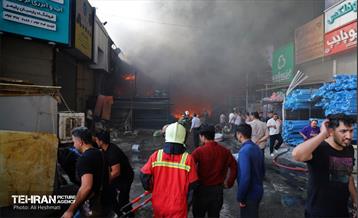 حریق در بازار آهن شادآباد 29