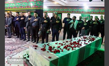 بدرقه پیکر مطهر شهید گمنام دوران دفاع مقدس در اداره‌کل سرمایه‌انسانی 11