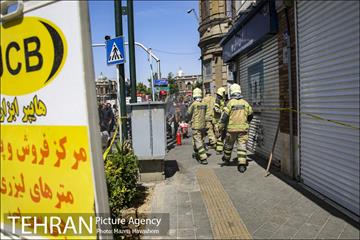 عملیات اطفا حریق در میدان حسن آباد 11