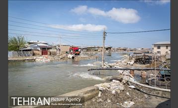 عملیات تخلیه آب از منازل مسکونی گمیشان 7