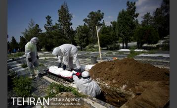 تطهیر و تدفین جانباختگان کرونایی در بهشت زهرا(س) 33