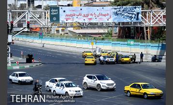 نصب تصاویر مربوط به دوران دفاع مقدس در معابر پایتخت 6