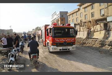 حریق در بازار آهن شادآباد 34