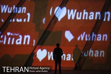 اکران تصاویری بر برج آزادی تهران برای همدردی با ملت چین 18