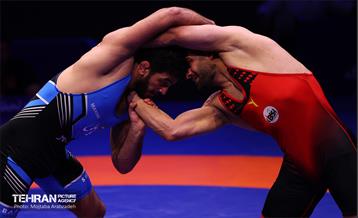 مراسم اهدای کاپ قهرمانی تیم‌های برتر کشتی آزاد توسط شهردار تهران و وزیر ورزش 12