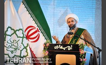 اهتزاز پرچم حرم حضرت معصومه (س) در برج میلاد 10