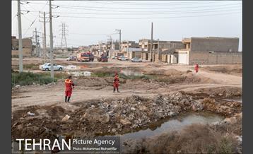 عملیات تخلیه آب از شهرک پیام اهواز 7